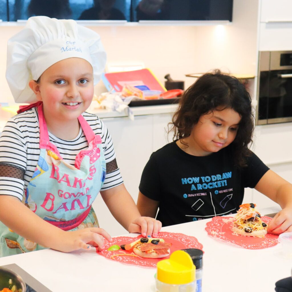 children cooking at the Epic